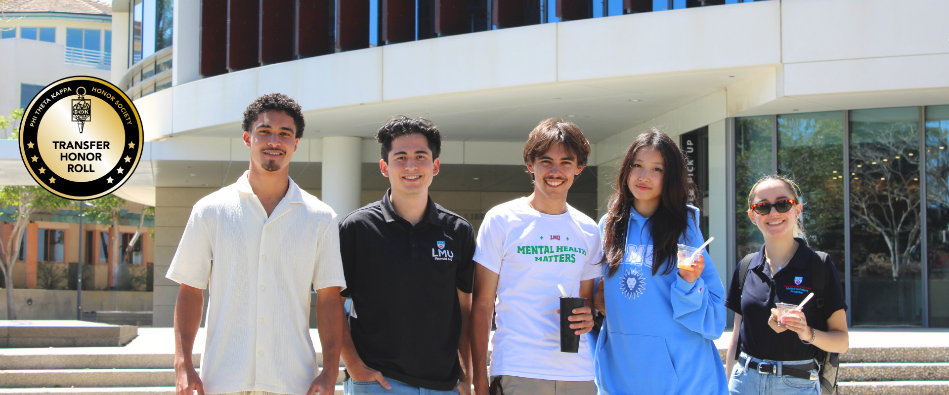 Students who work for the transfer admission office posing with ice cream from the Ice cream social for admitted transfers.